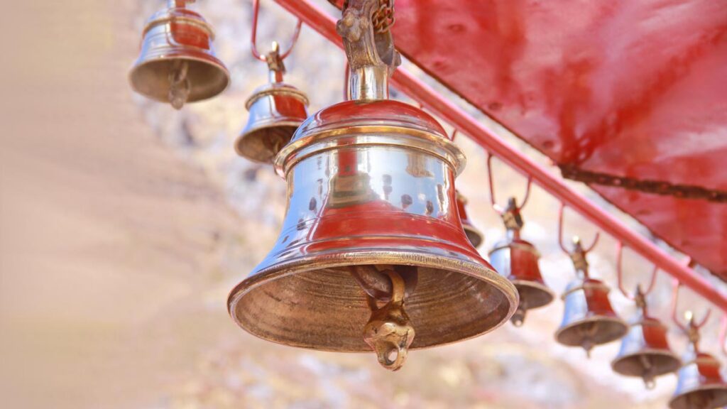 Why do bells ring during worship?