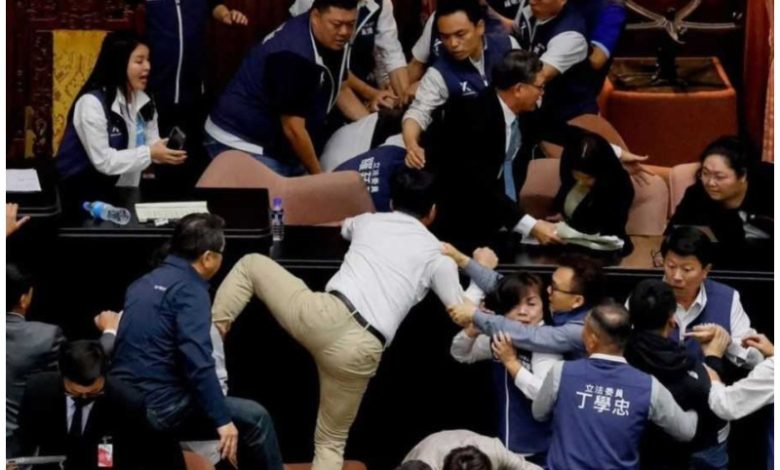 Taiwan Parliament Clash: Chaos in Taiwan's Parliament, MP runs away with copy of bill