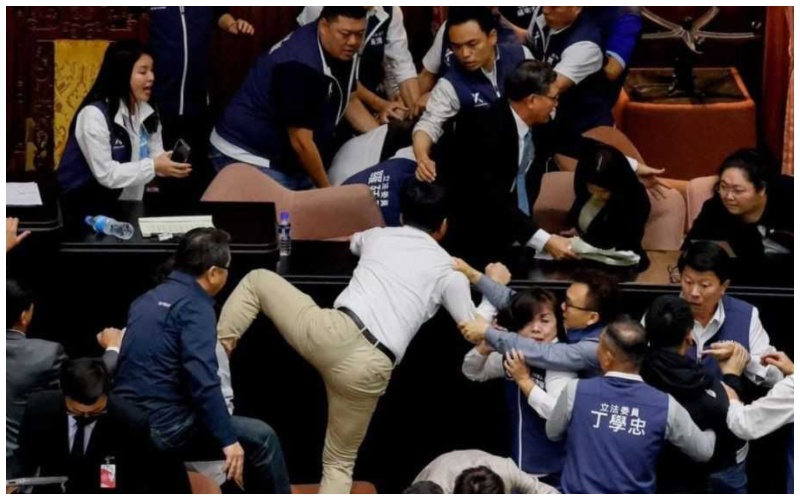 Taiwan Parliament Clash: Chaos in Taiwan's Parliament, MP runs away with copy of bill