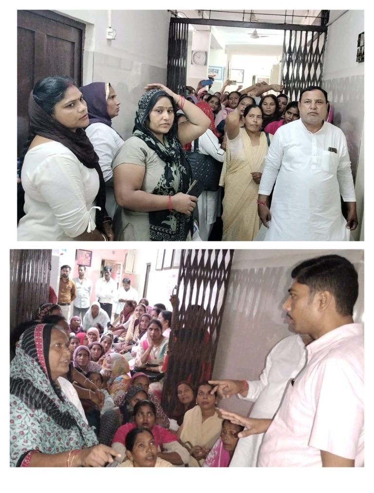 Asha workers staged a sit-in outside the gate of the chief medical officer at Saharanpur district hospital