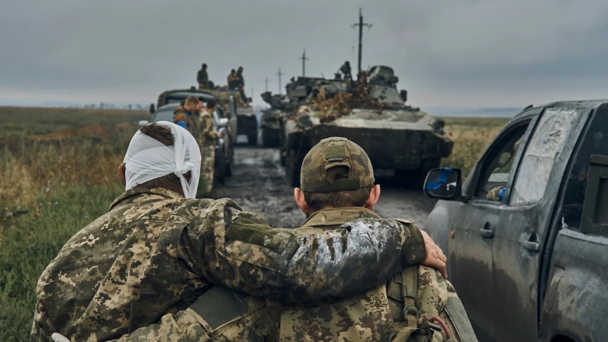 Symbolic image representing the death of two Indian citizens in the Russia-Ukraine war, showing a somber atmosphere and the impact of the conflict on families.