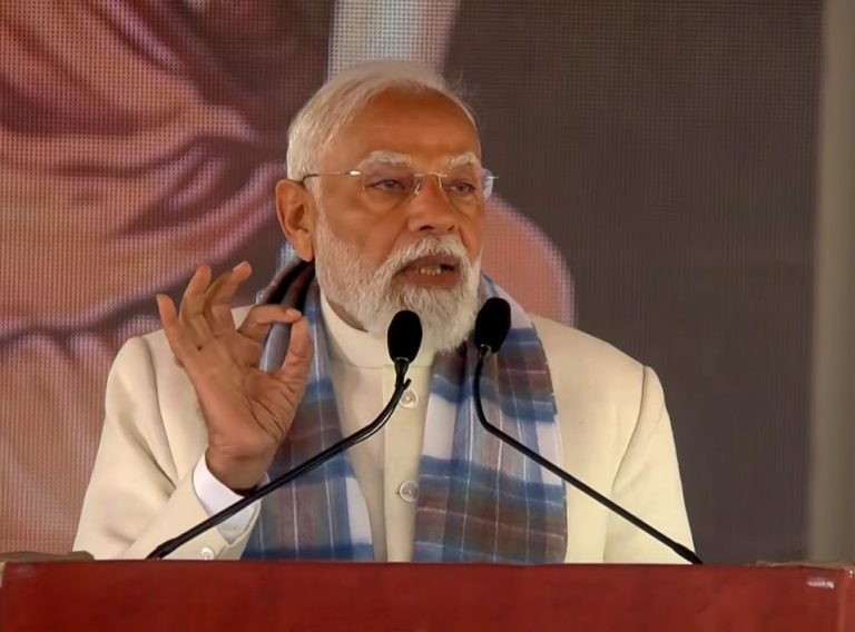 PM Modi Pongal 2026 Celebration: PM Modi addressing the audience during Pongal 2026 celebration, highlighting Tamil culture and farmers’ contributions.
