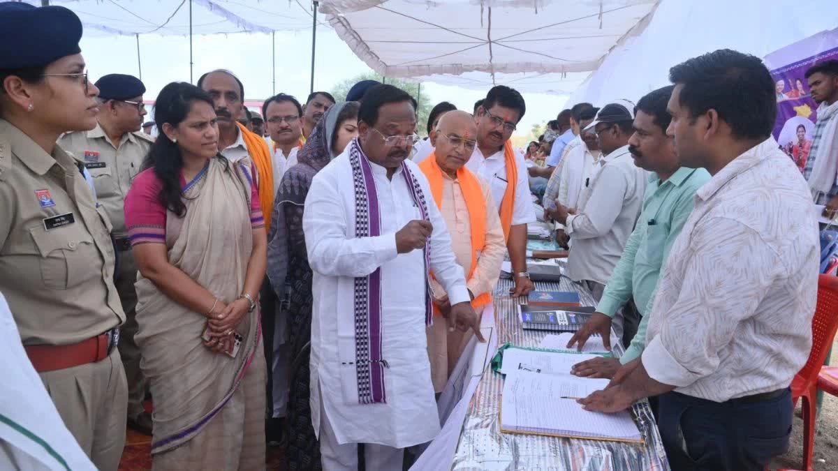 Good Governance Festival Chhattisgarh: Minister Ramvichar Netam interacting with villagers during Good Governance Festival Chhattisgarh grievance redressal camp in Morga, MCB district.