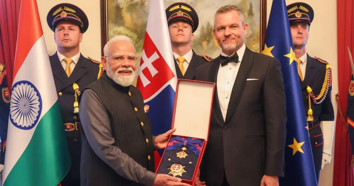PM Modi Slovakia Highest Honor: Prime Minister Narendra Modi receiving Slovakia's highest state honor, Order of the White Double Cross First Class, from Slovak President Peter Pellegrini in Bratislava.
