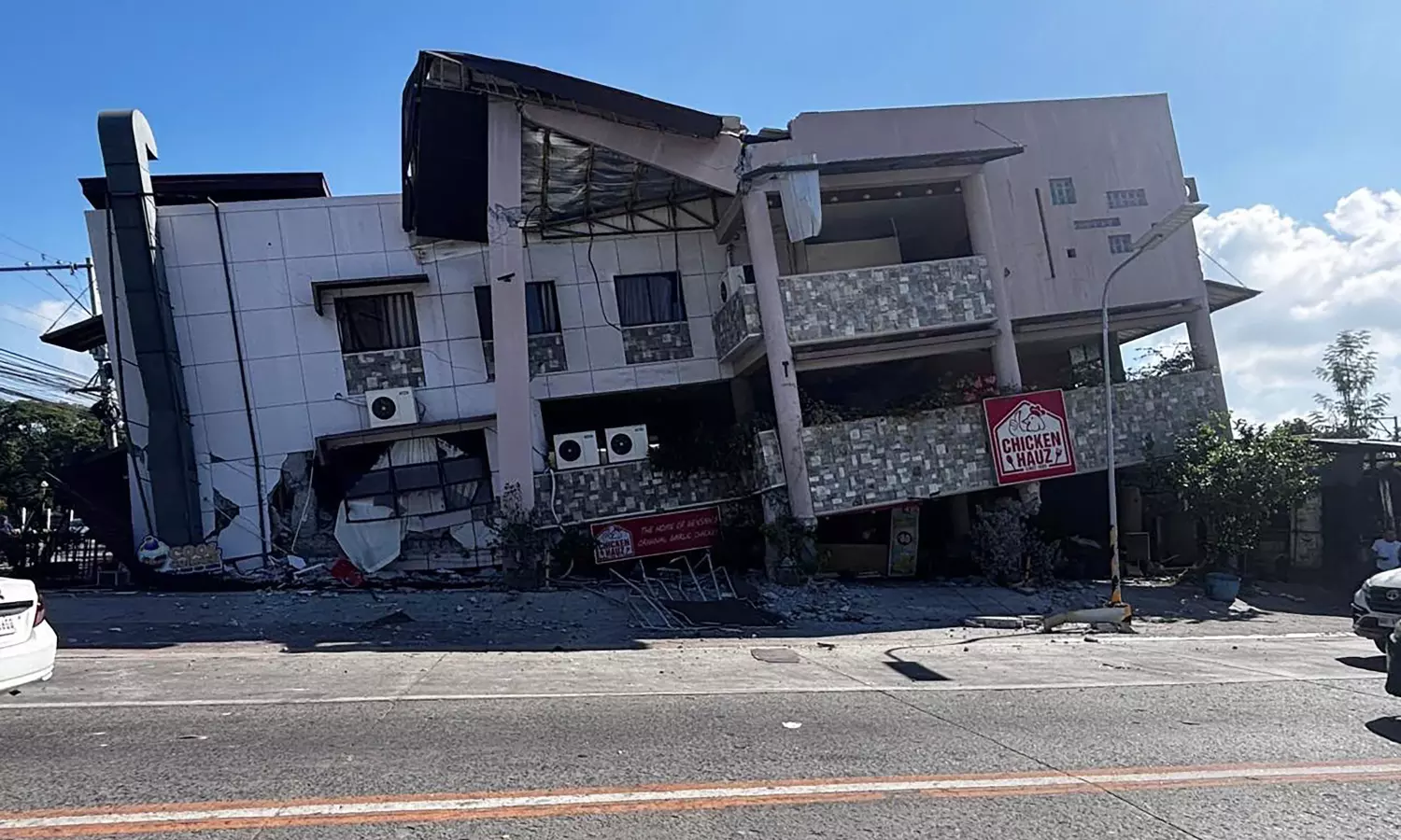 Philippines Earthquake 2026: Philippines Earthquake 2026 destruction showing collapsed buildings, landslides, rescue teams, and damaged infrastructure after a powerful 7.8 magnitude earthquake.