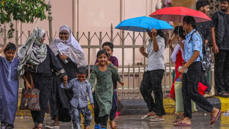 Weather Update showing heavy rain alerts across 13 states and heatwave conditions continuing in Uttar Pradesh.