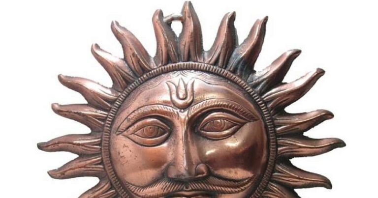 Copper Sun on Main Door: Main door decorated with a copper sun symbol placed in the right direction as per Vastu Shastra for positive energy and prosperity.