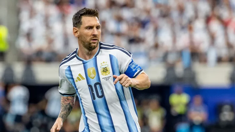 Lionel Messi Argentina Hero: Lionel Messi celebrating with Argentina teammates after providing two decisive assists in the FIFA World Cup 2026 semifinal against England.