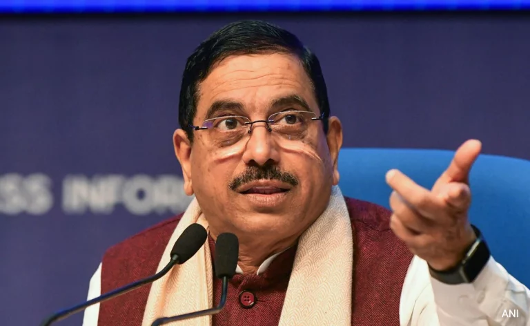Prahlad Joshi addressing the media after receiving additional charge of the Education Ministry following Pradhan's resignation.