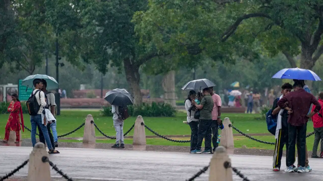 IMD Weather Updates showing heavy rainfall forecast, Delhi Orange Alert, and monsoon conditions across Uttar Pradesh, Bihar, Uttarakhand, Maharashtra, and other Indian states.