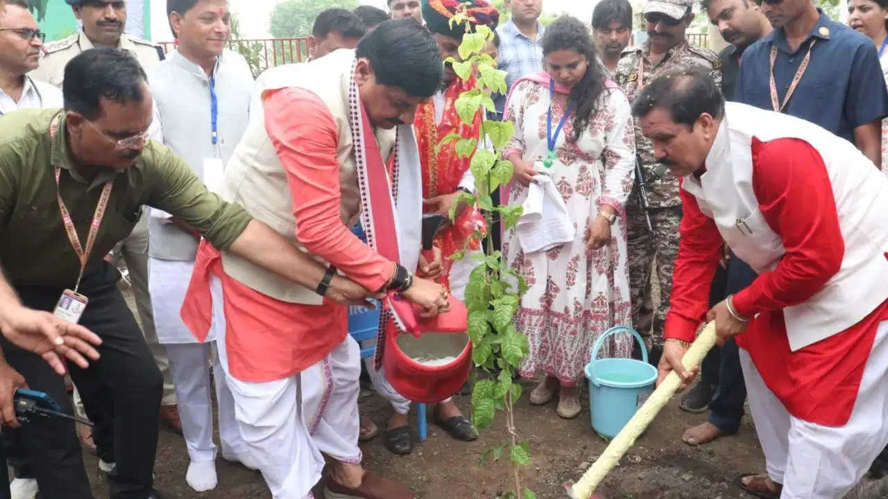 Water Conservation Campaign: Madhya Pradesh CM Mohan Yadav plants a sapling and distributes electric vehicles and tricycles during the Water Conservation Campaign closing ceremony in Rajgarh.