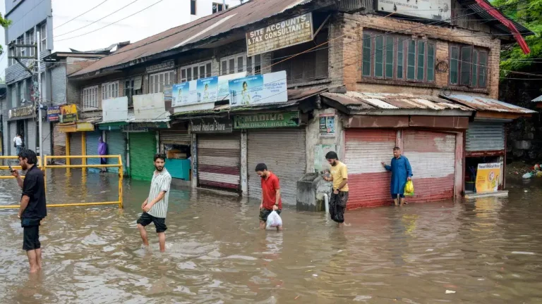 IMD Monsoon Update showing flood-hit areas in Assam, landslides in Uttarakhand and Jammu & Kashmir, and heavy rainfall across northern India.